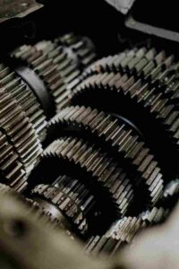 Close-up of transmission gears. Experience quality repairs at Bay Automotive with transparent gearbox fix costs