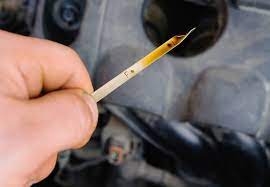 dirty engine oil indicates it's time for oil change service